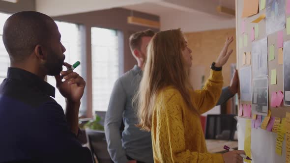 Young creative professionals working in a modern office