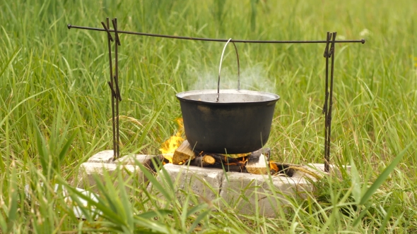 Touristic Cauldron on a Fire