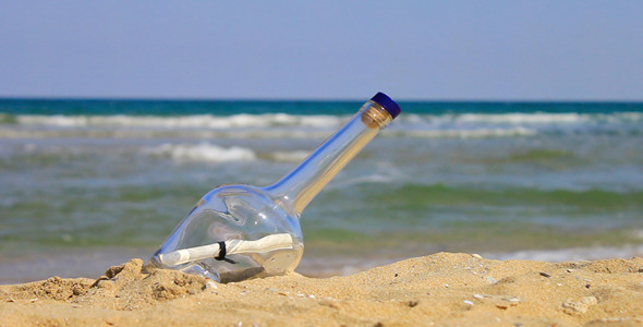 Letter In A Bottle On The Beach