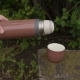 Thermos with Tea Poured Into a Cup - VideoHive Item for Sale