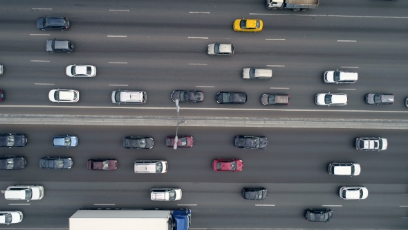 Traffic Jam Concept. Cars and Lorries Wait for Their Turn To Move