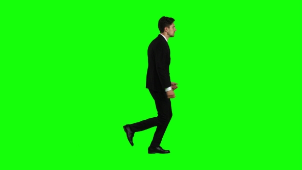 Businessman Is in a Hurry To Work, He Starts To Run. Green Screen