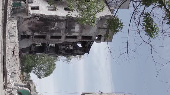 Vertical Video of the Consequences of the War in Ukraine  a Destroyed Building