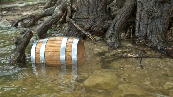 a Barrel of Wood Floating on the Waves in the Sea