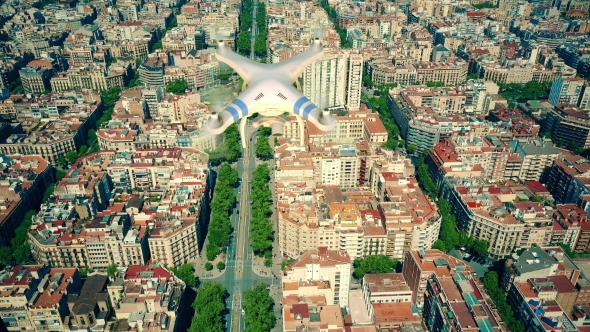 Drone Flying and Filming Above Barcelona Blocks Pattern