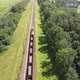 Cargo Train on the Rails. Following The Freight Train, Aerial - VideoHive Item for Sale