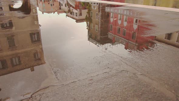 Reflected in the water of the homes of Venice