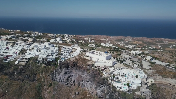 Santorini Aerial View Video of Greek Island with White Houses and Blue Roofs on Sunset and in the