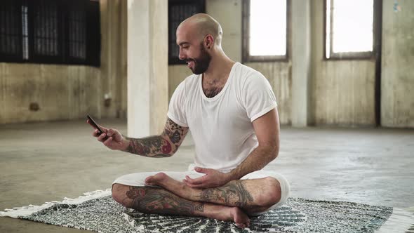 Man Continuous Texting on Mobile Phone