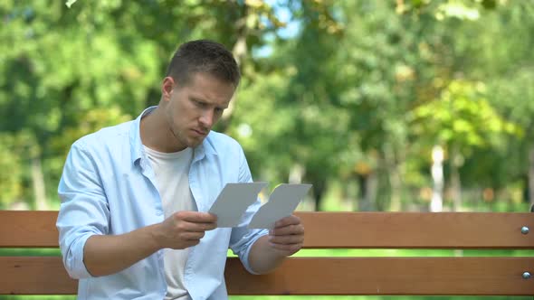 Lonely Man Putting Torn Family Picture Together, Missing Wife After Divorce