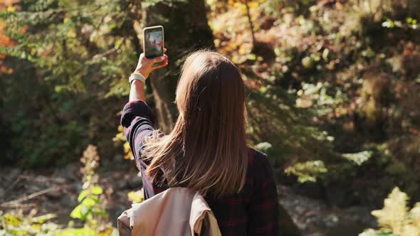 Hiker is Photographing Nature By Smartphone