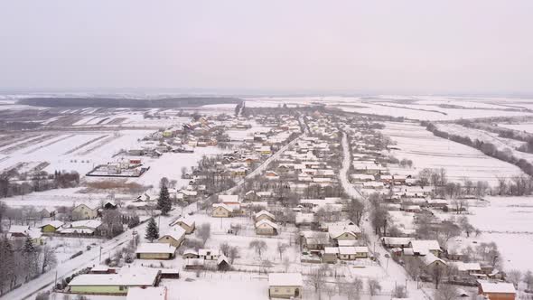 Beautiful winter landscape of Ukrainian village and nature. Snowy and cold weather