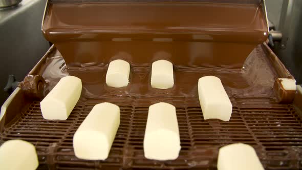 Chocolate Sweets on the Conveyor Belt