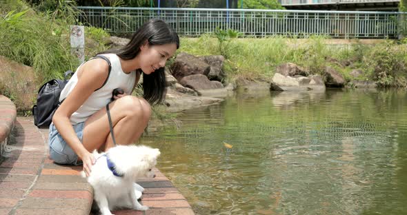 Woman her her dog in the park