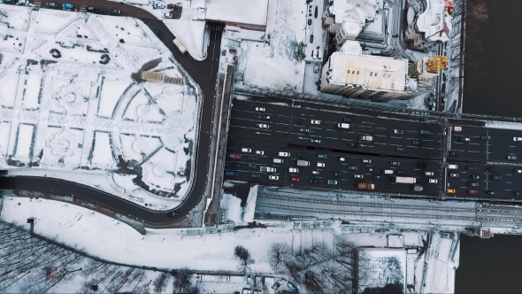 Aerial Top View Car Road City Traffic Near Living Houses Area Cvered in Snow