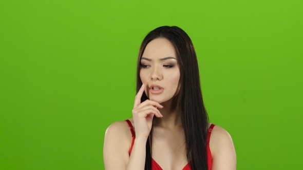 Girl Is Looking for Answers To Questions and Finds a Solution. Green Screen