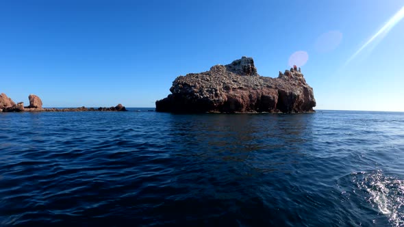 A small rocky island home to hundreds of seals near La Paz Mexico in Baja California Sur