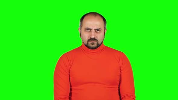 Caucasian Man Throws Up His Hands and Squirms His Face, Feels Disappointed. Green Screen. Slow