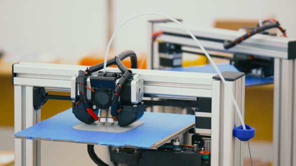 Printer Prints a 3D Prototype Parts Modeled on the Computer