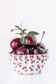 fresh red cherries on a white paper shape - PhotoDune Item for Sale