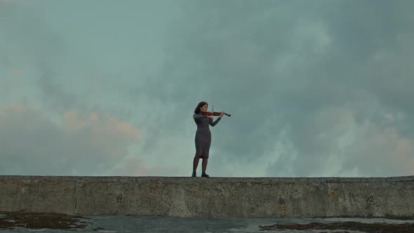 Lonely Woman Is Playing Violin