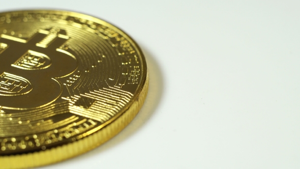 Crypto Currency Gold Bitcoin - BTC - Bit Coin.  Shots Crypto Currency Bitcoin Coins Rotatin