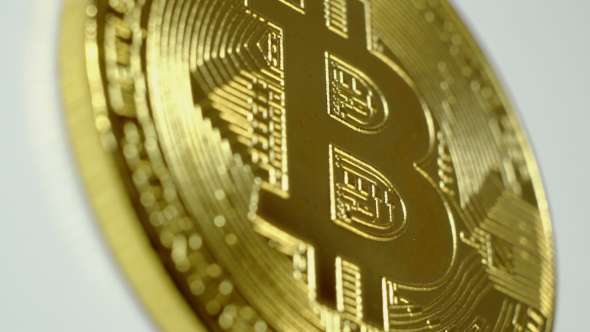 Crypto Currency Gold Bitcoin - BTC - Bit Coin.  Shots Crypto Currency Bitcoin Coins Rotatin
