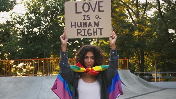 Afroamerican Woman in LGBT Pride Flag