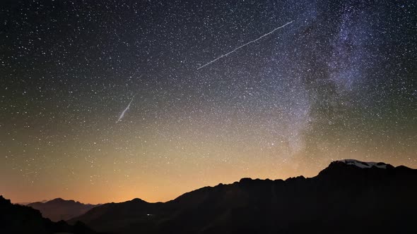 Meteor Explosion, Meteor Shower and Stardust Smoke Trail in Night Sky Time Lapse