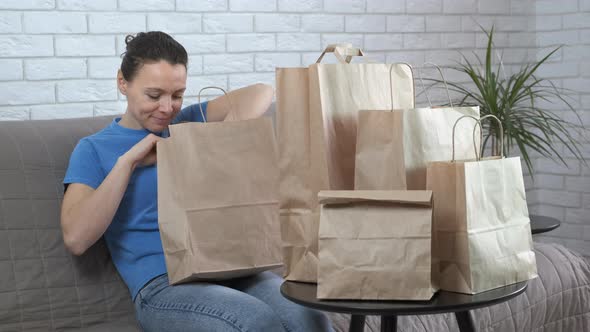 Excited Woman with Shopping Bags