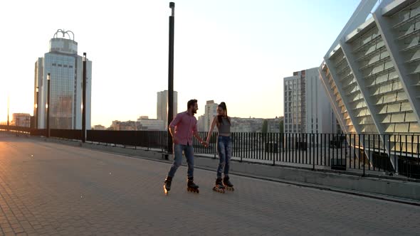 Couple Rollerblading Outdoor