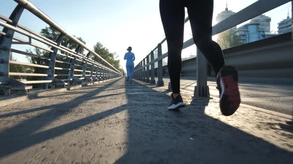 Sporty Urban Runners During Outdoor Workout