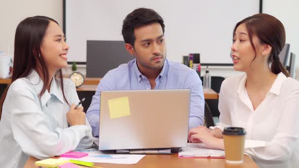 Group of young Startup coworkers working together to get ideas and marketing at office