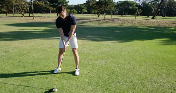 Golfer playing golf