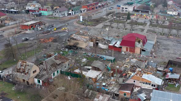 Aerial view of the road. Aerial view of the destroyed and burnt houses.