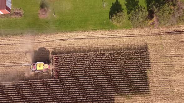 Top Down View Of Combine Harvester At Work In A Corn Field In Southeast Michigan Near Carlton Michig