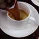 Hot Black Coffee Is Poured Into a White Cup - VideoHive Item for Sale