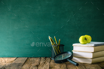 encils, apple and school equipment.
