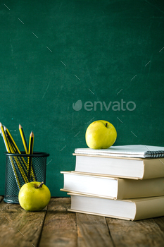 encils, apple and school equipment.