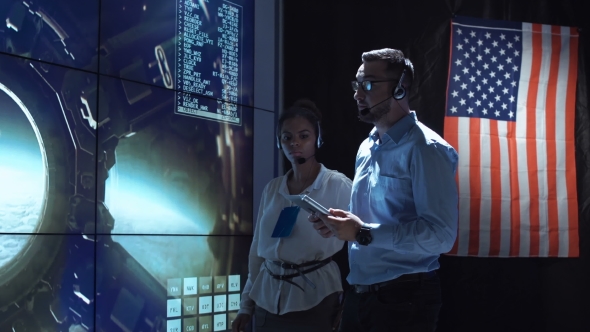 Scientists in Flight Control Center