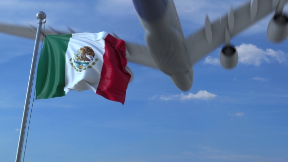 Commercial Airplane Landing Behind Waving Mexican Flag