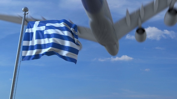 Commercial Airplane Landing Behind Waving Greek Flag