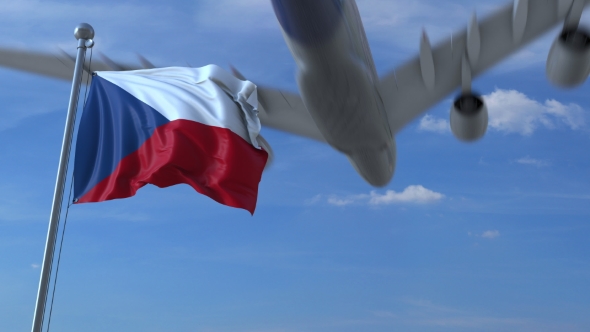 Commercial Airplane Landing Behind Waving Czech Flag alt