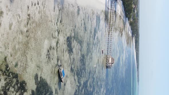 Vertical Video of Low Tide in the Ocean Near the Coast of Zanzibar Tanzania Aerial View