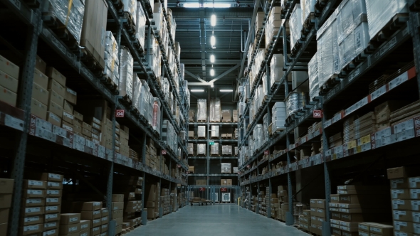 Steadycam Shot of Big Warehouse with Many Goods for Building or Repair Shopping Mall or Stock with