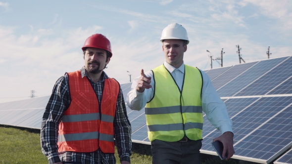 Solar Panel Maintenance Workers Outside