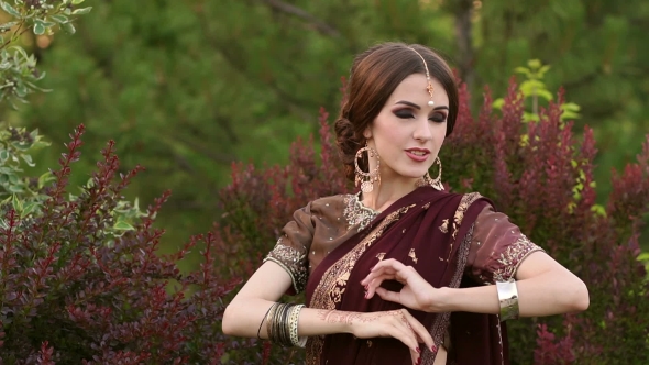 Indian Girl with Kundan Jewellery and Mehendi.