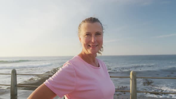 Senior woman smiling on a promenade