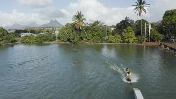 Aerial view of a person doing wakeboard in a swimming pool, Mauritius.