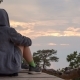 Girl in a Hoodie Sits, and Contemplates the Sky - VideoHive Item for Sale